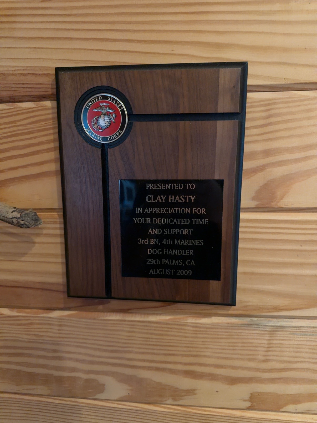 Marine Corps plaque presented to Clay Hasty in 2009