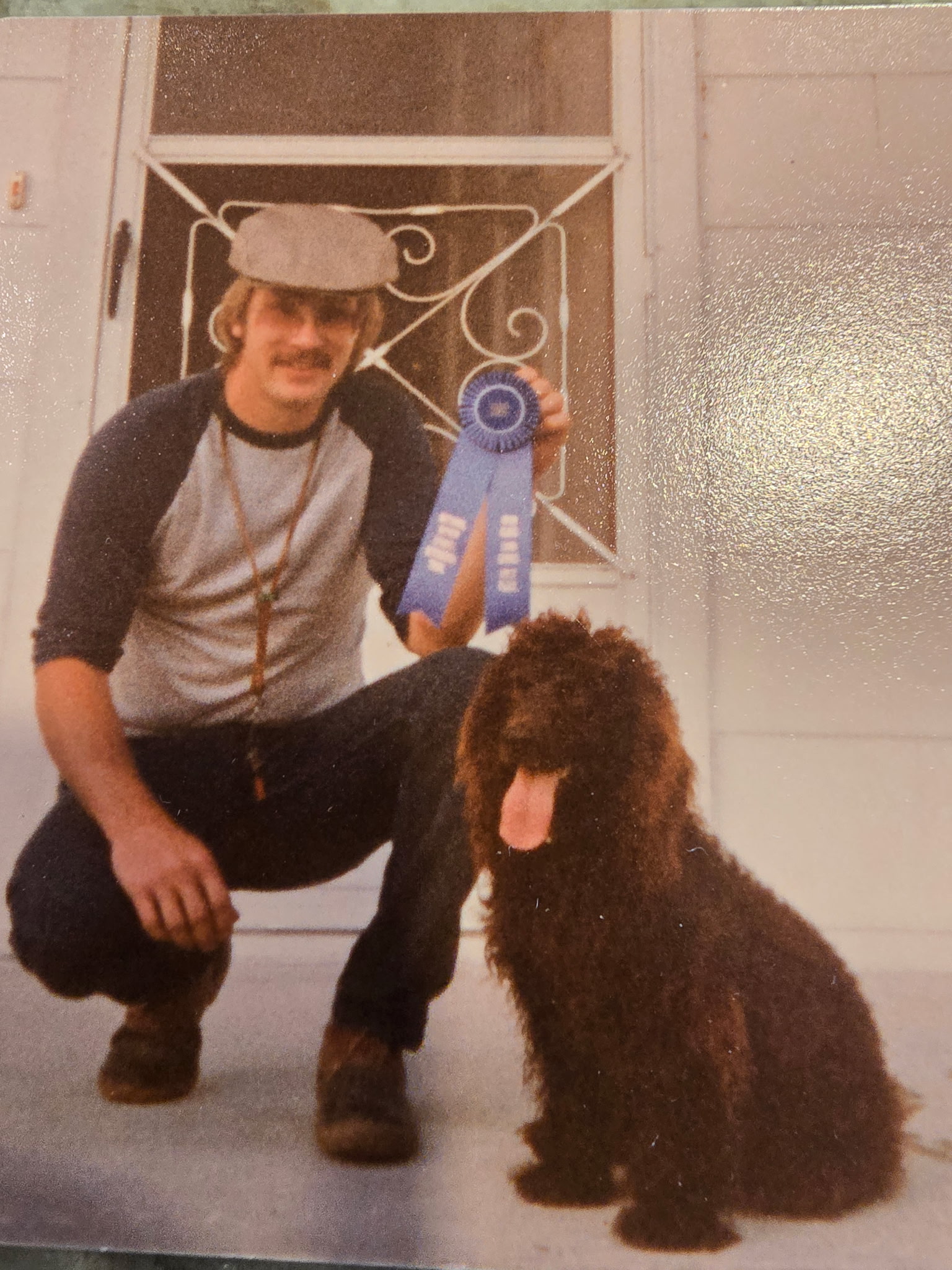 Young Clay Hasty with a Boykin Spaniel and ribbon in 1981